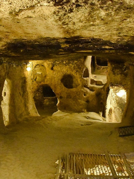 Kaymaki Underground City interior with stone walls and passageways in Goreme Valley, Cappadocia.