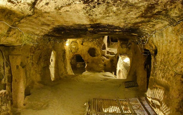 Kaymaki Underground City interior with stone walls and passageways in Goreme Valley, Cappadocia.