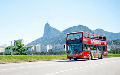 Rio Samba Bus in front of Sugarloaf Mountain, Rio de Janeiro Hop-on Hop-off Tour.