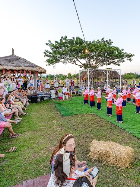 Traditional Thai dancers performing at Yi Peng and Loy Krathong Festival 2025 in Chiang Mai.