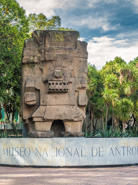 Stone sculpture at the entrance of the National Museum of Anthropology, Mexico City.