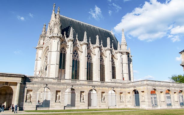 Gothic chapel at Château de Vincennes, Paris, with ornate spires and arches.
