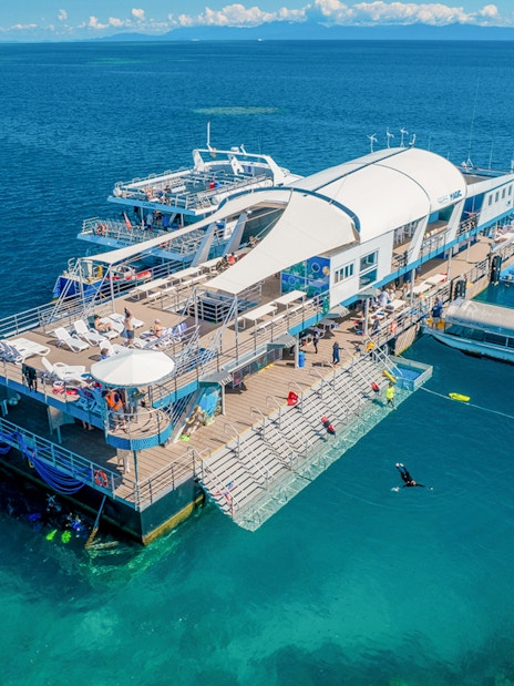 Aerial view of a pontoon with tourists in the Great Barrier Reef, Australia.