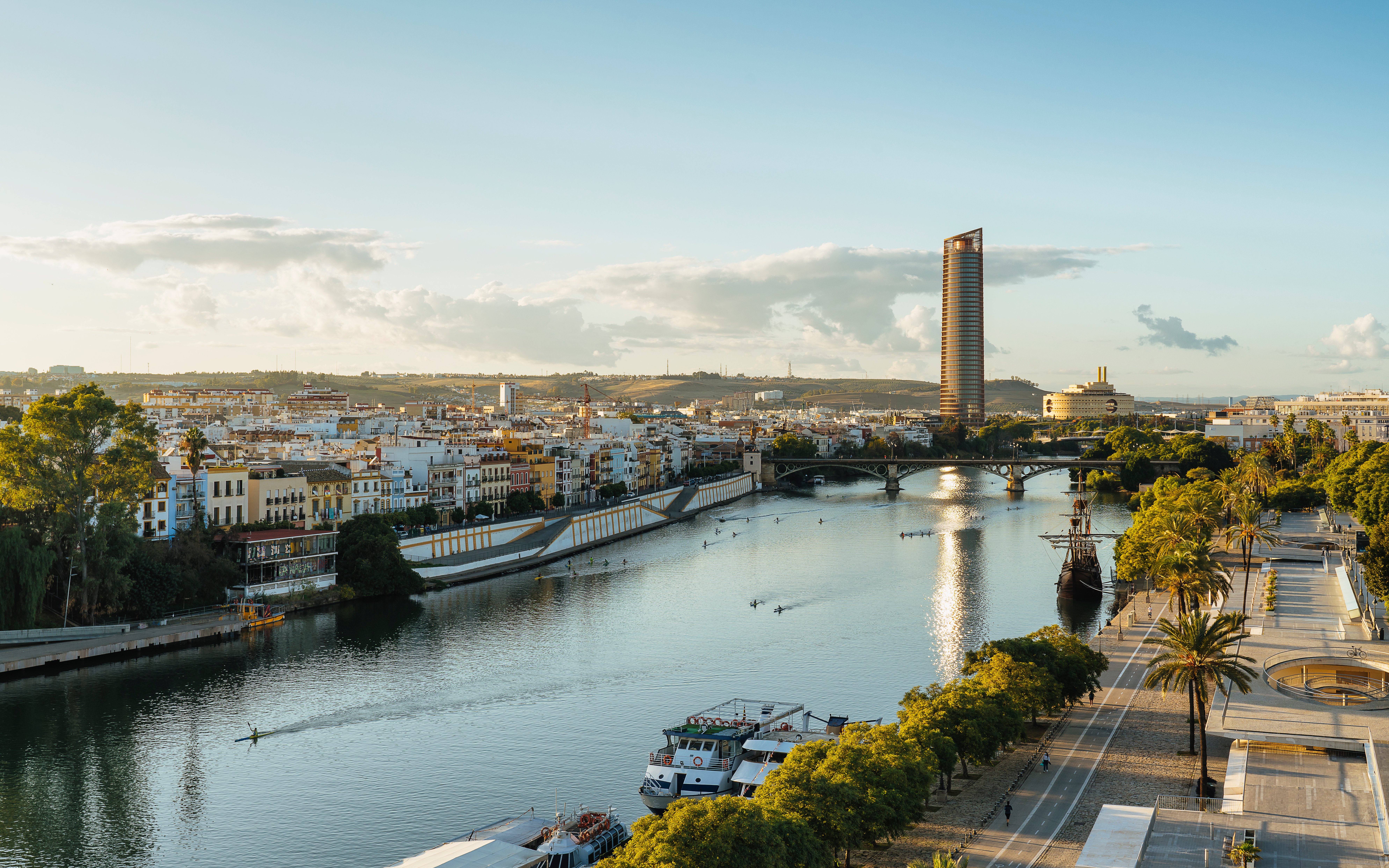 Panoramic view of Guadalquivir River with Triana and Seville Tower, Spain.