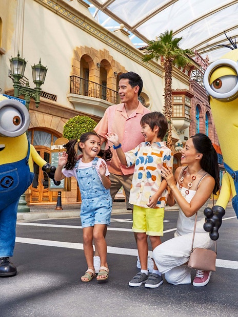 Family enjoying time with Minions at Universal Studios Singapore.