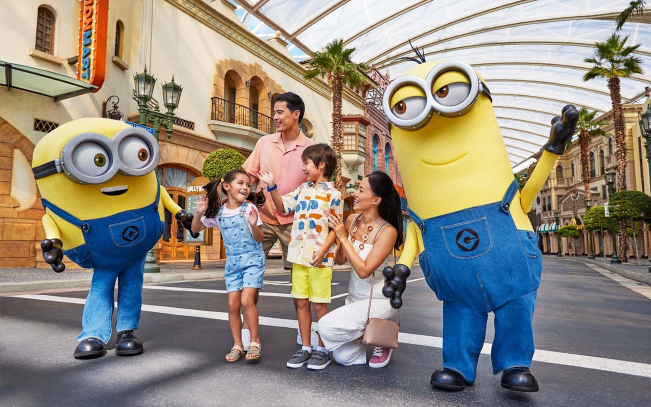 Family enjoying time with Minions at Universal Studios Singapore.