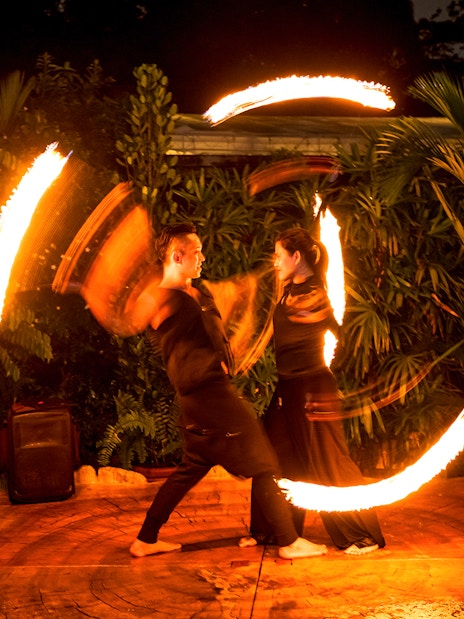 Thumbuakar fire performers at Night Safari, Singapore Zoo.