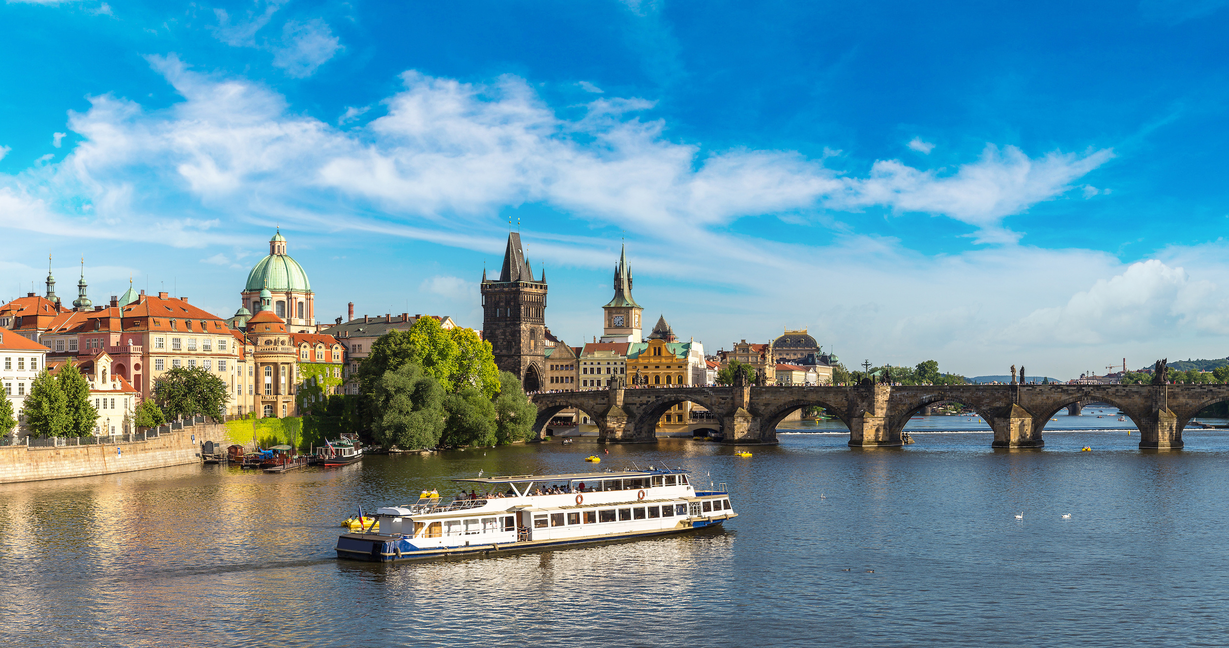 Vltava River cruise with view of Charles Bridge in Prague.