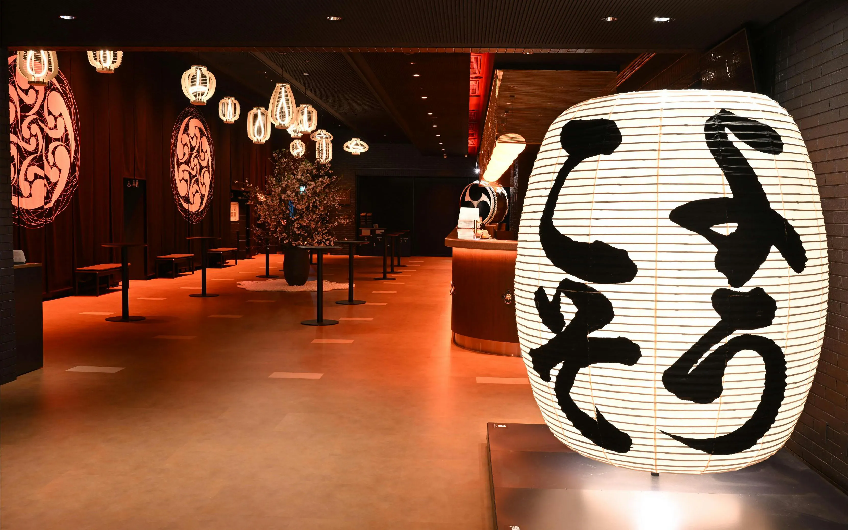 DRUM TAO Theater Kyoto lobby with traditional lanterns and decor.