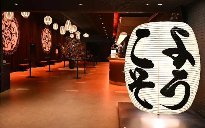 DRUM TAO Theater Kyoto lobby with traditional lanterns and decor.
