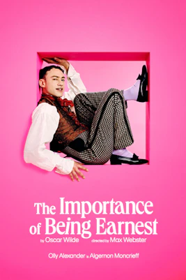 Theater stage with actors performing "The Importance of Being Earnest" in London.