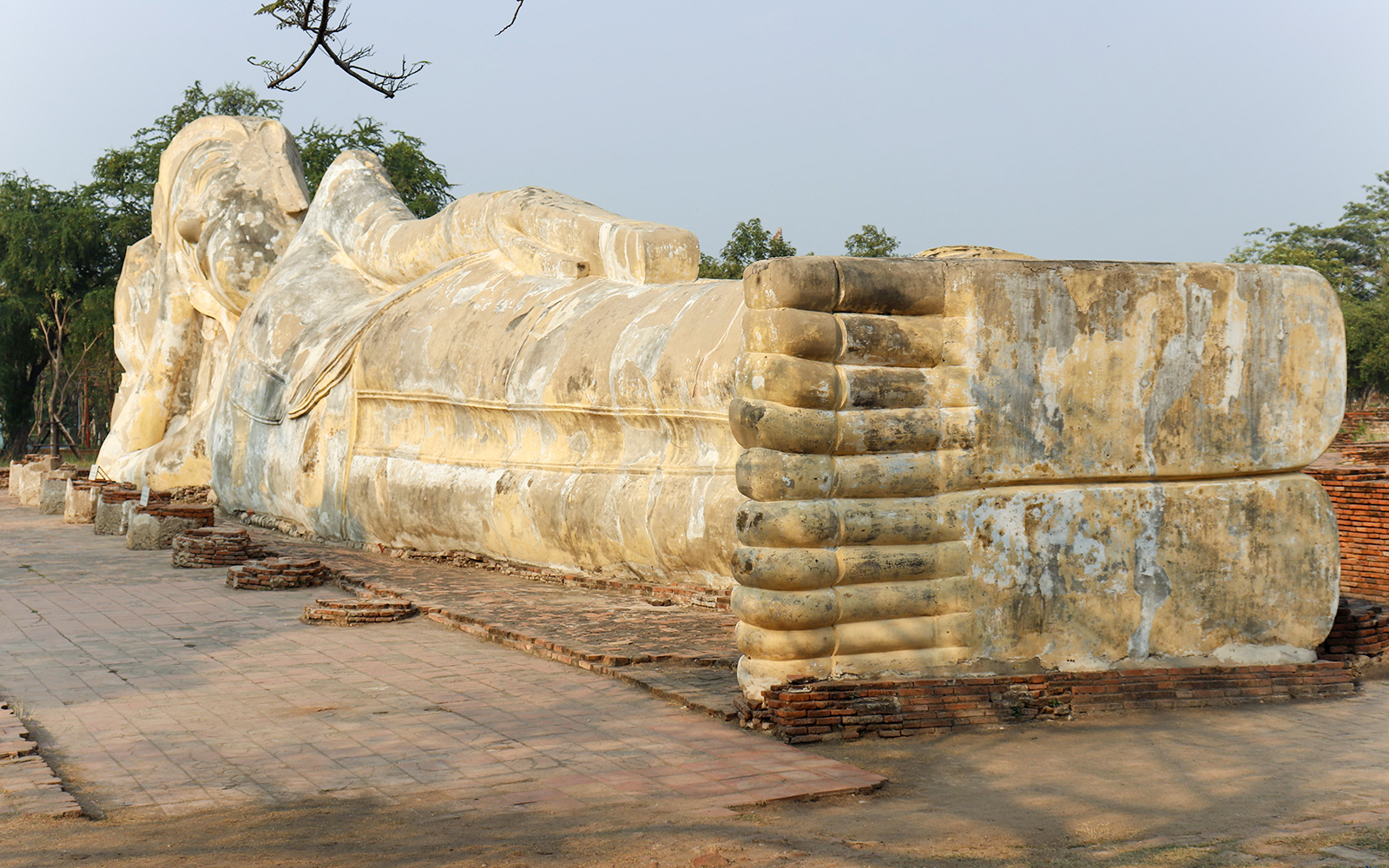 Reclining Buddha statue at Lokayasutharam temple, Ayutthaya, Thailand.