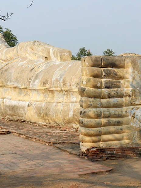 Reclining Buddha statue at Lokayasutharam temple, Ayutthaya, Thailand.