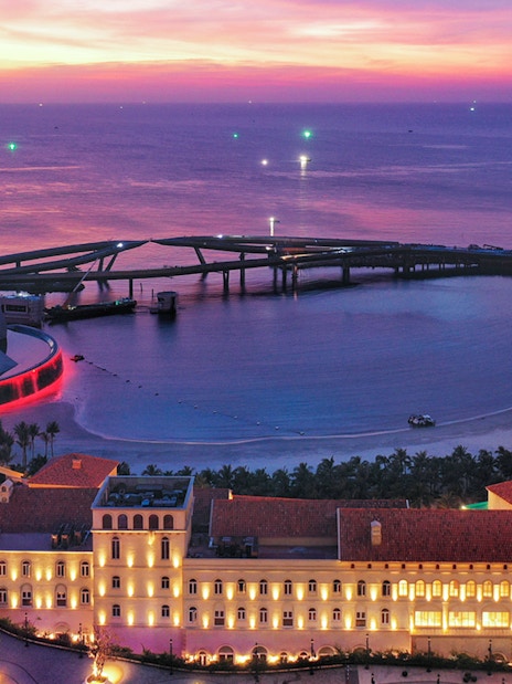 Sunset view of An Thoi Town with the world's longest seacrossing cable car system to Hon Thom Island.