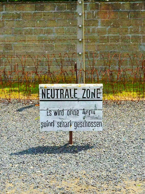 Sign reading 'Neutral Zone' at Sachsenhausen Concentration Camp Memorial, Germany.