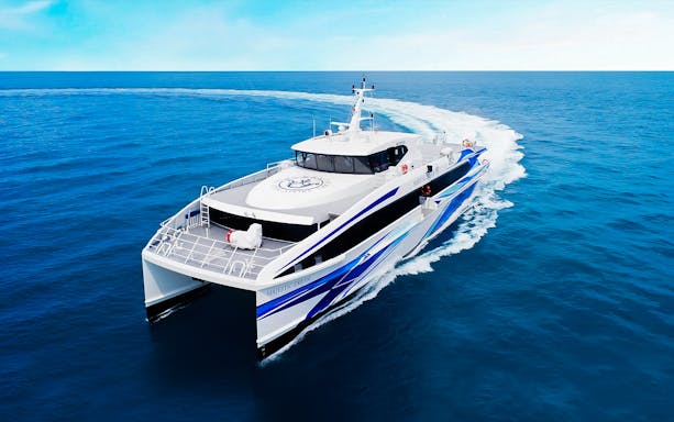 Majestic Fast Ferry cruising on open sea, offering passenger transport.