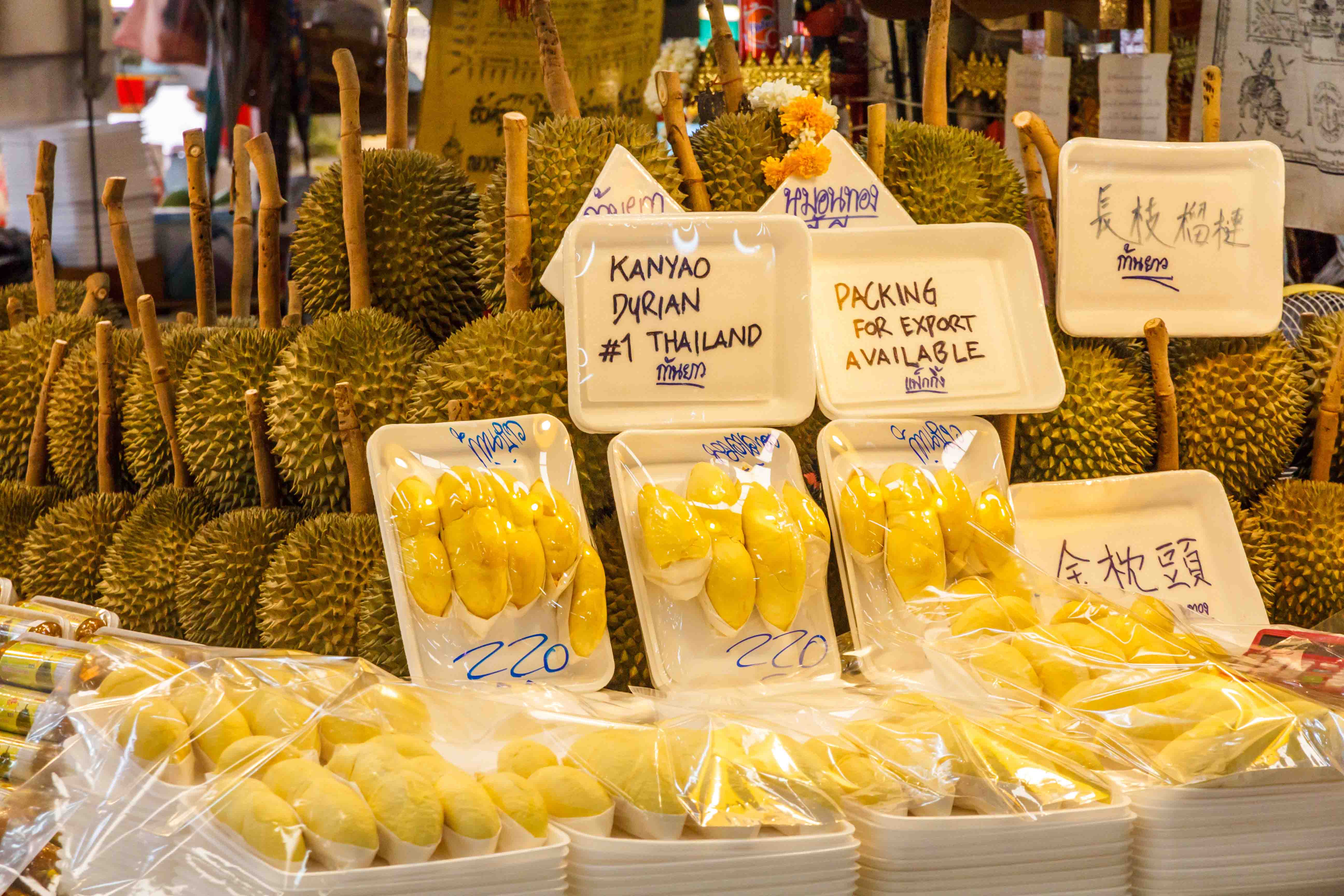 Or Tor Kor Market in Bangkok showcasing fresh produce and local delicacies.