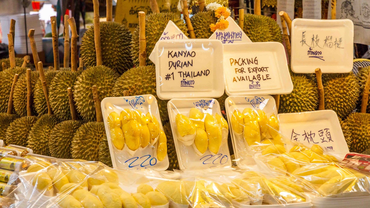 Or Tor Kor Market in Bangkok showcasing fresh produce and local delicacies.