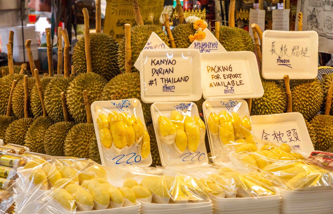 Or Tor Kor Market in Bangkok showcasing fresh produce and local delicacies.