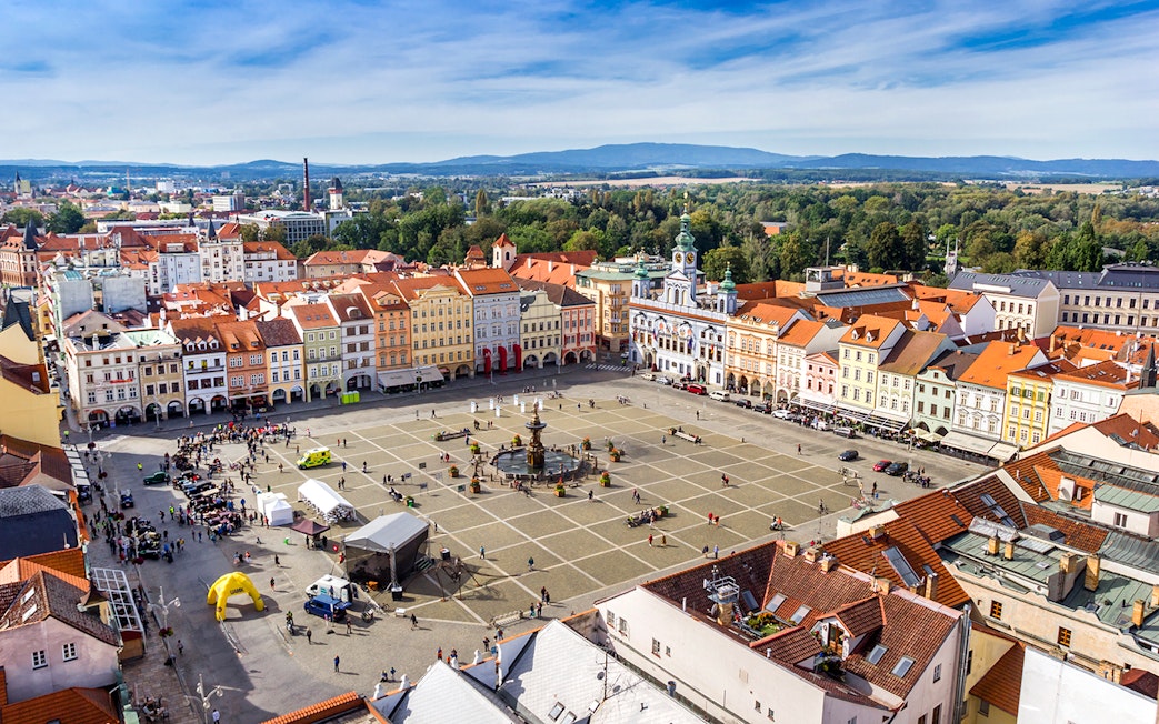 Aerial view of Ceske Budejovice market square with Samson Fountain and historic buildings.