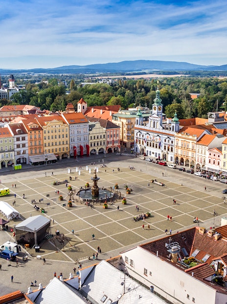 Aerial view of Ceske Budejovice market square with Samson Fountain and historic buildings.