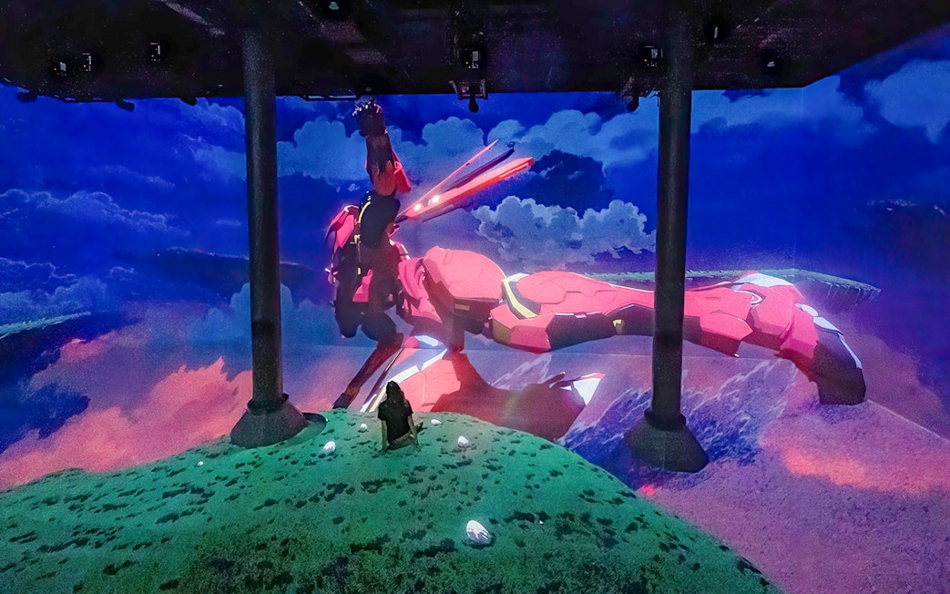 Guests viewing digital art installation at ARTECHOUSE New York.