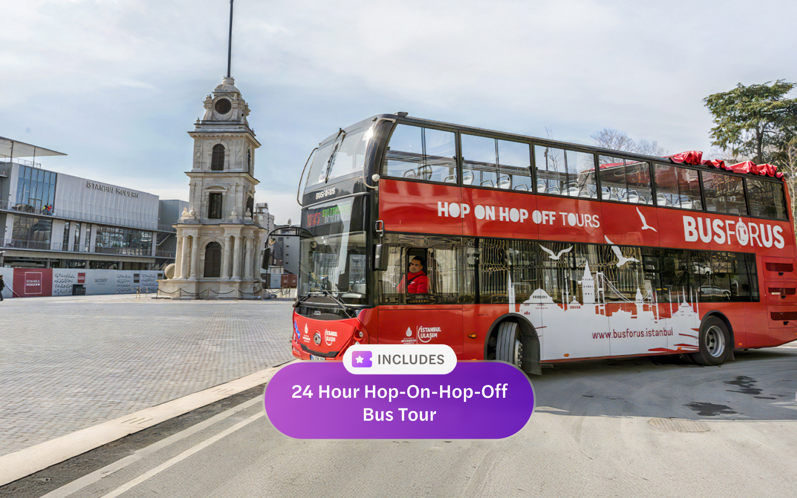 Hop-on hop-off bus near Istanbul clock tower.