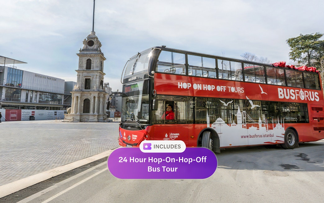 Hop-on hop-off bus near Istanbul clock tower.