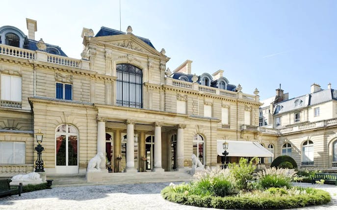 Jacquemart André Museum exterior with ornate architecture and garden in Paris.