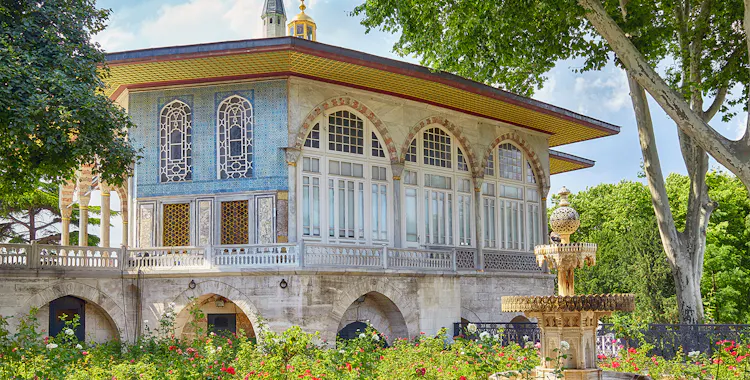 car surrounded by decoration in Dubai Miracle Garden