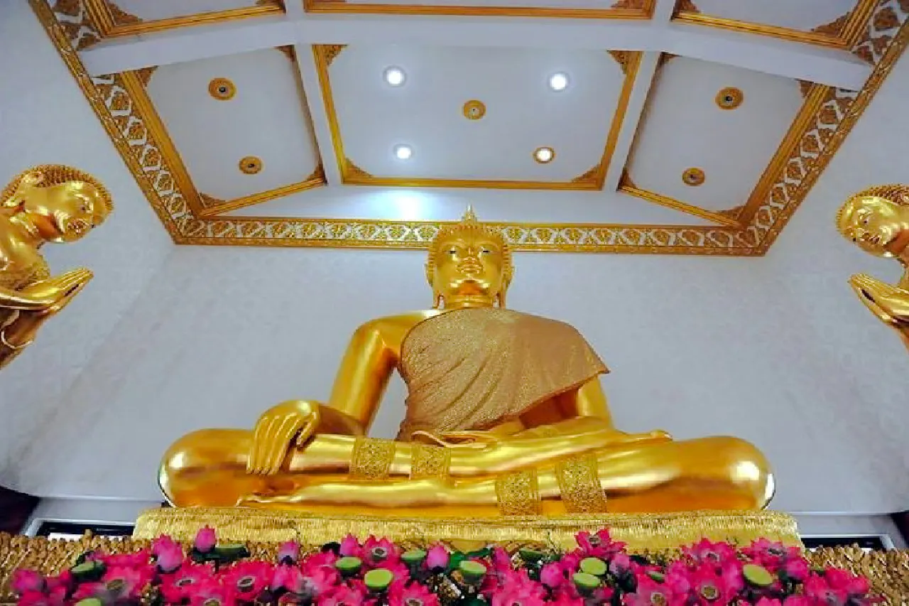 Golden Buddha statue at Wat Paknam, part of Bangkok Temple Tour by MyProGuide.