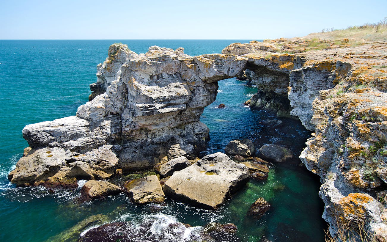 Rocky arch formation over the Black Sea in Tyulenovo, Bulgaria.