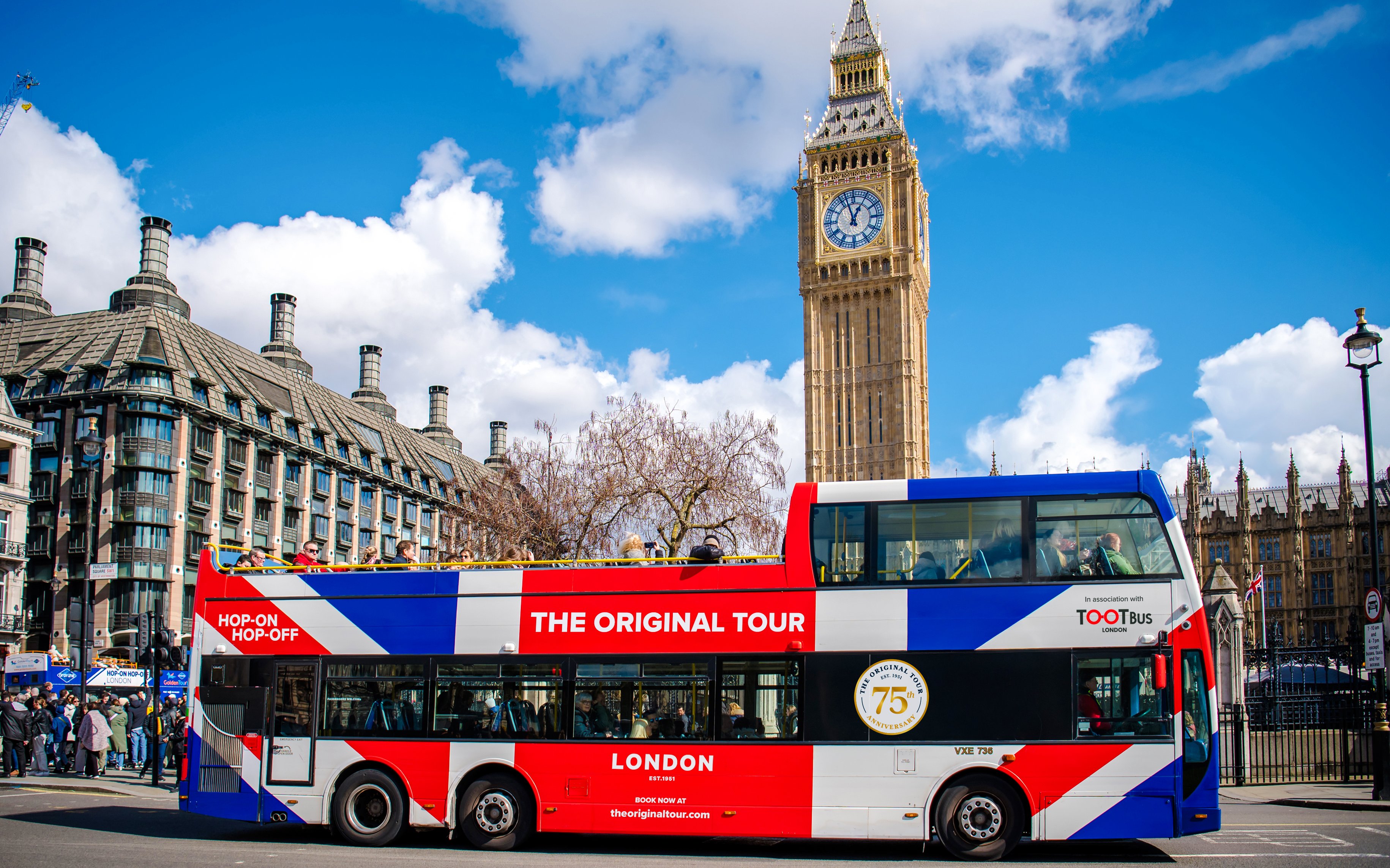 Tootbus tour bus near Big Ben in London.
