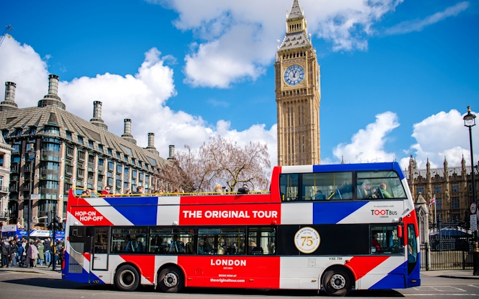 Tootbus tour bus near Big Ben in London.
