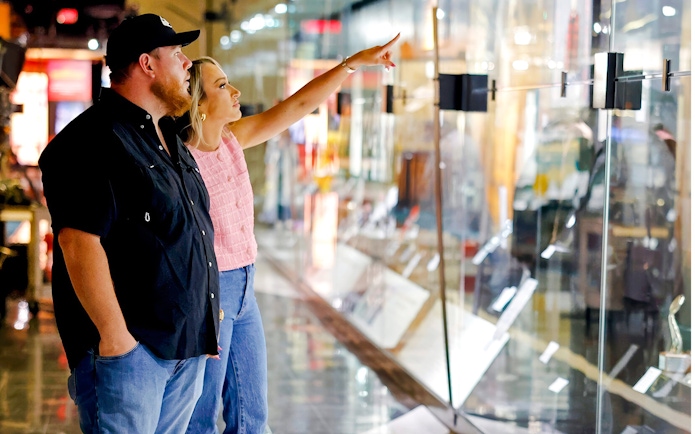 Visitors exploring exhibits at the Country Music Hall of Fame.
