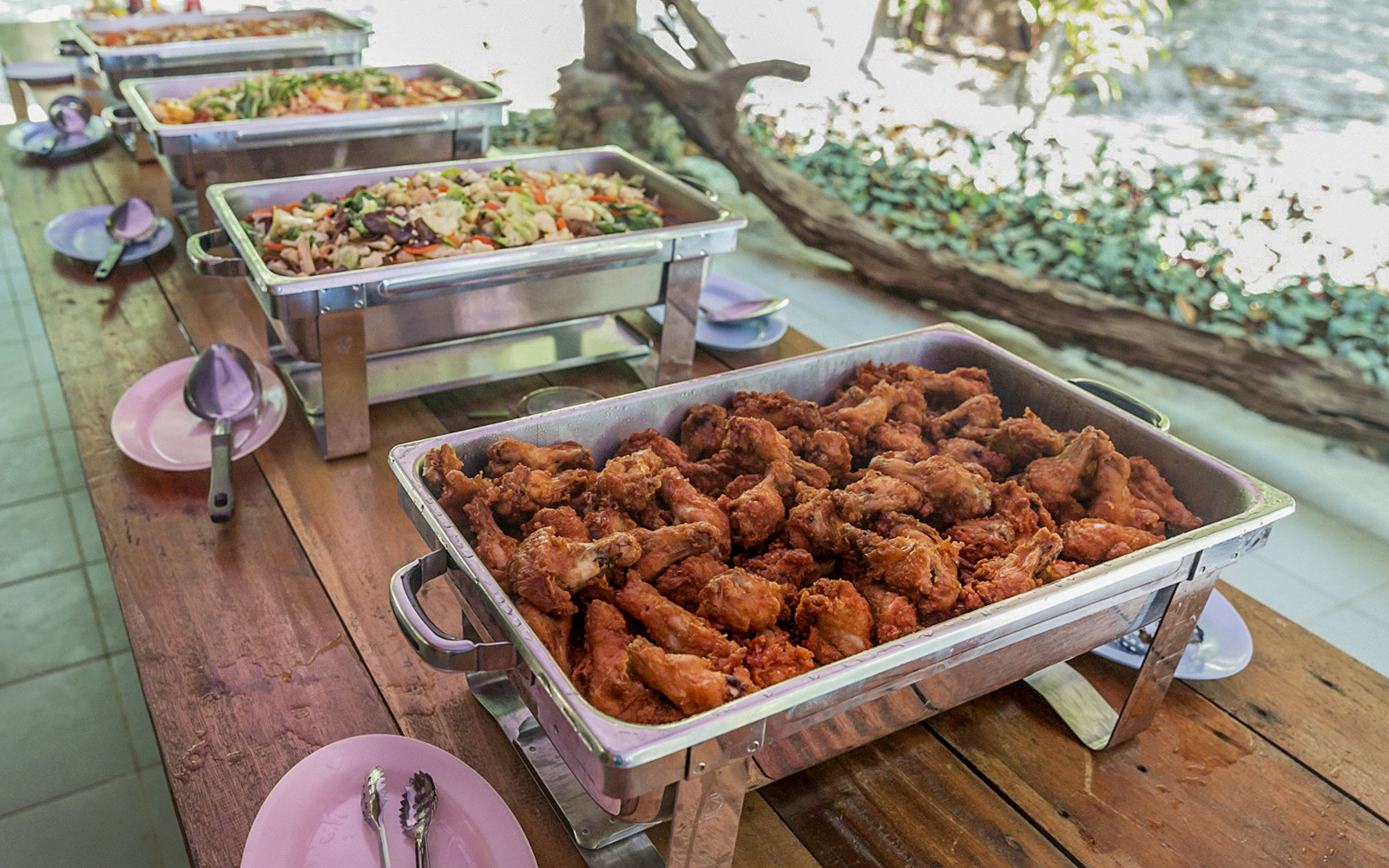 Buffet lunch with fried chicken and vegetable dishes on Surin Island day trip from Phuket.
