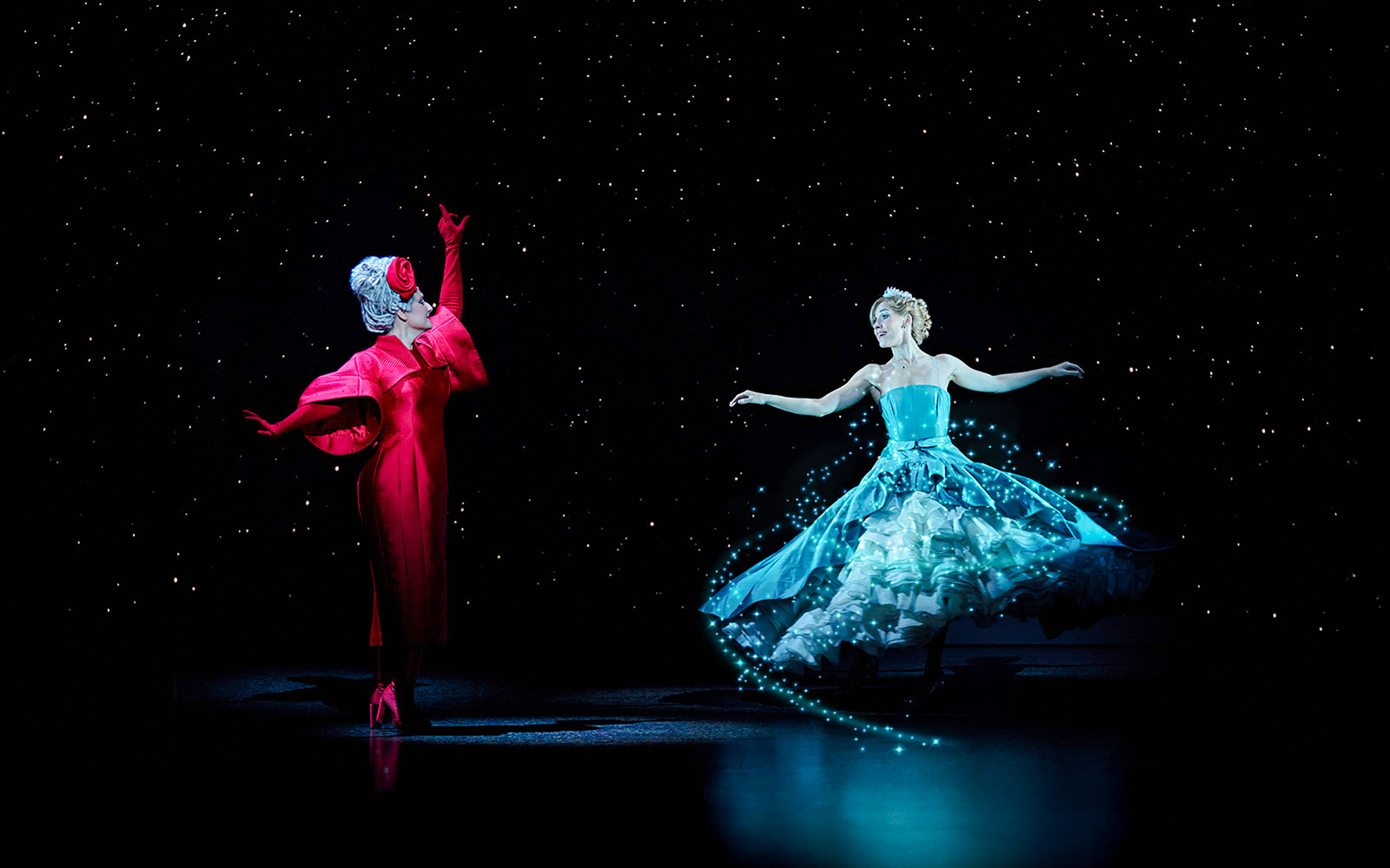 Cinderella and fairy godmother on stage during Madrid performance.