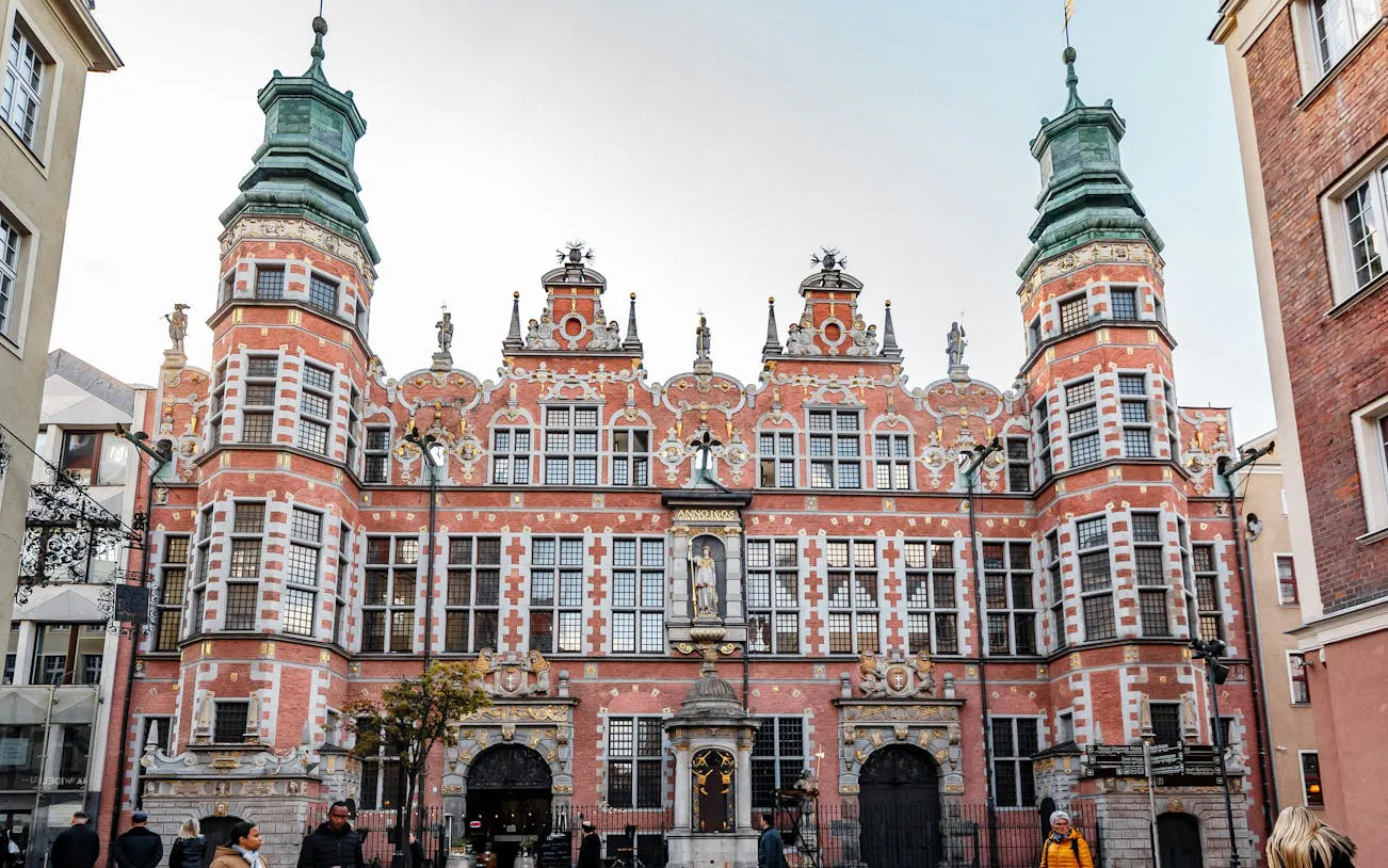 Gdansk Old Town Hall with ornate facade, part of self-guided city exploration game.