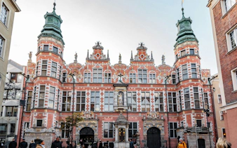 Gdansk Old Town Hall with ornate facade, part of self-guided city exploration game.
