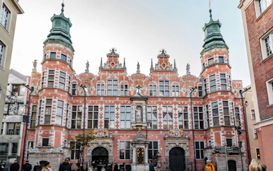 Gdansk Old Town Hall with ornate facade, part of self-guided city exploration game.