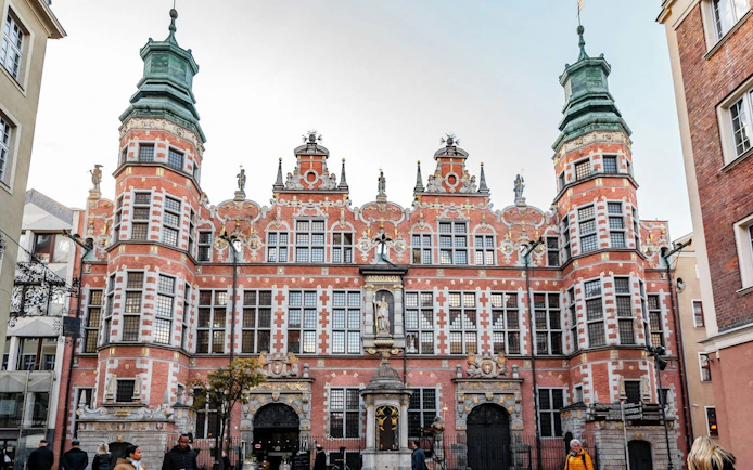 Gdansk Old Town Hall with ornate facade, part of self-guided city exploration game.