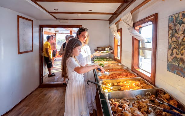Guests enjoying buffet on Blue Lagoon Dreamy Cruise from Ayia Napa/Protaras.