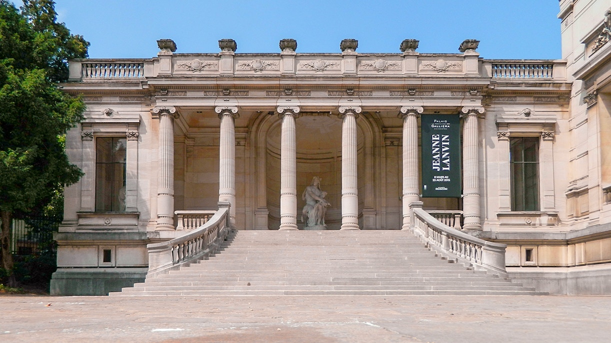 Palais Galliera exterior with grand staircase and columns in Paris, France.