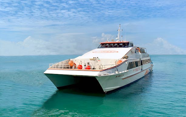 Fast ferry on clear waters, route Tanah Merah to Tanjung Pengelih.