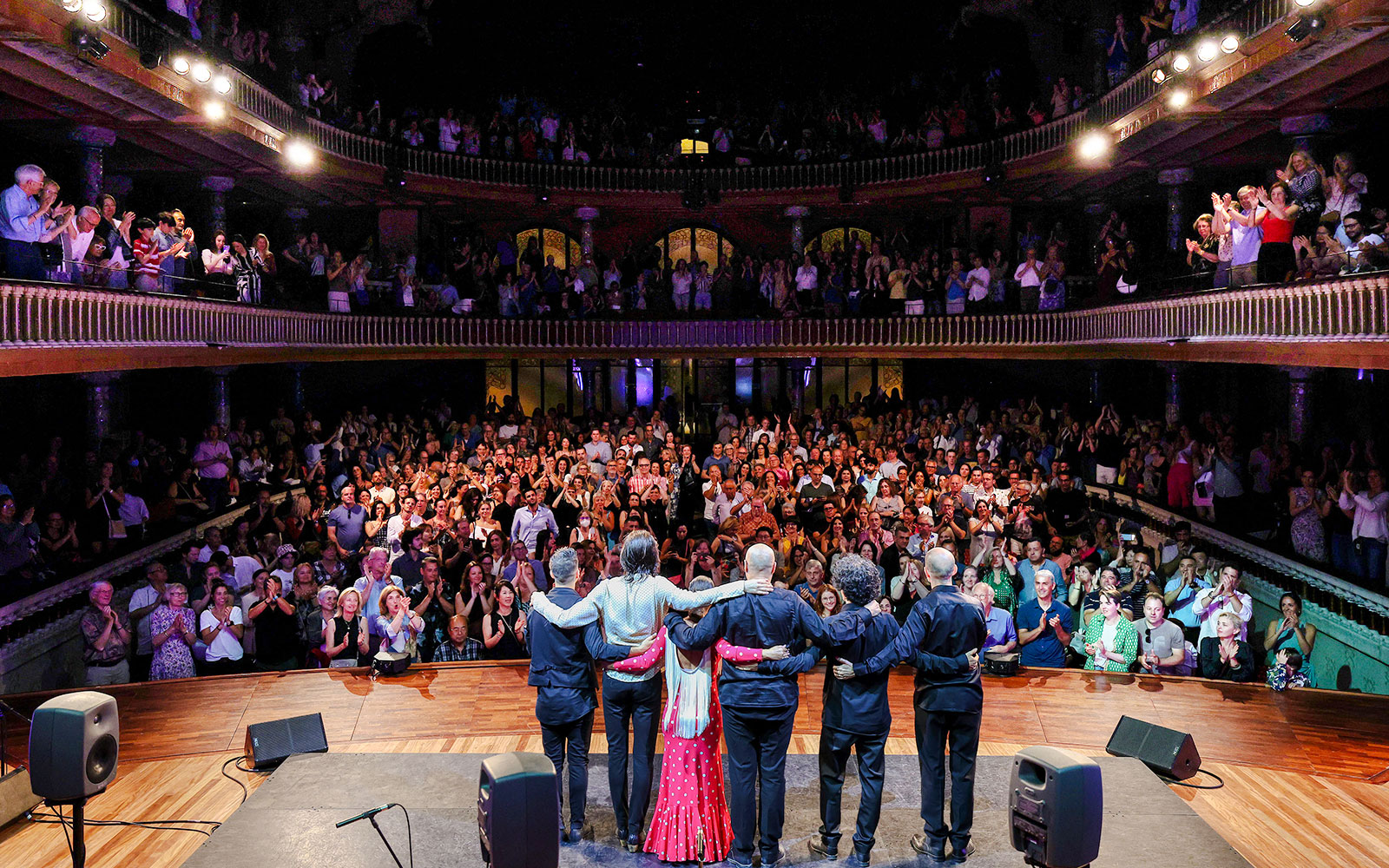 Flamenco artists greet audience at Palau de la Música, Barcelona.