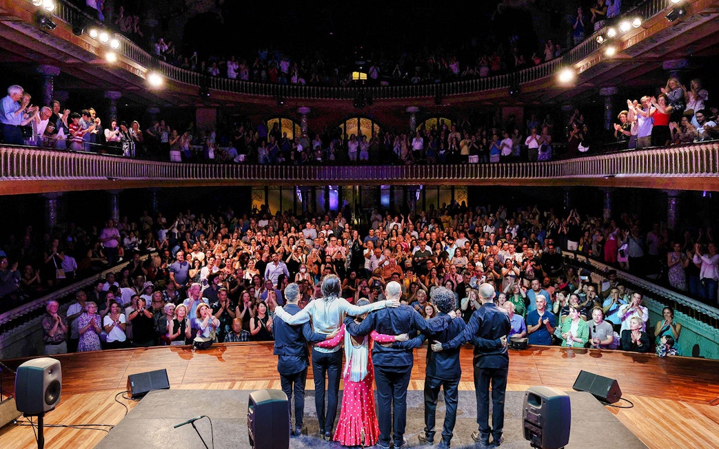 Flamenco artists greet audience at Palau de la Música, Barcelona.