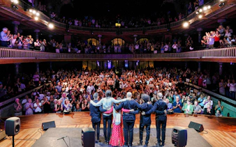 Flamenco artists greet audience at Palau de la Música, Barcelona.