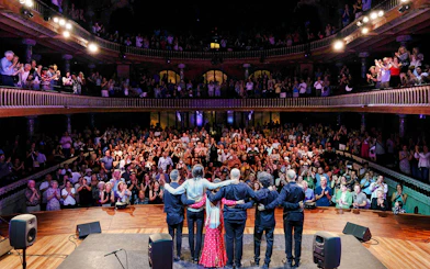 Flamenco artists greet audience at Palau de la Música, Barcelona.