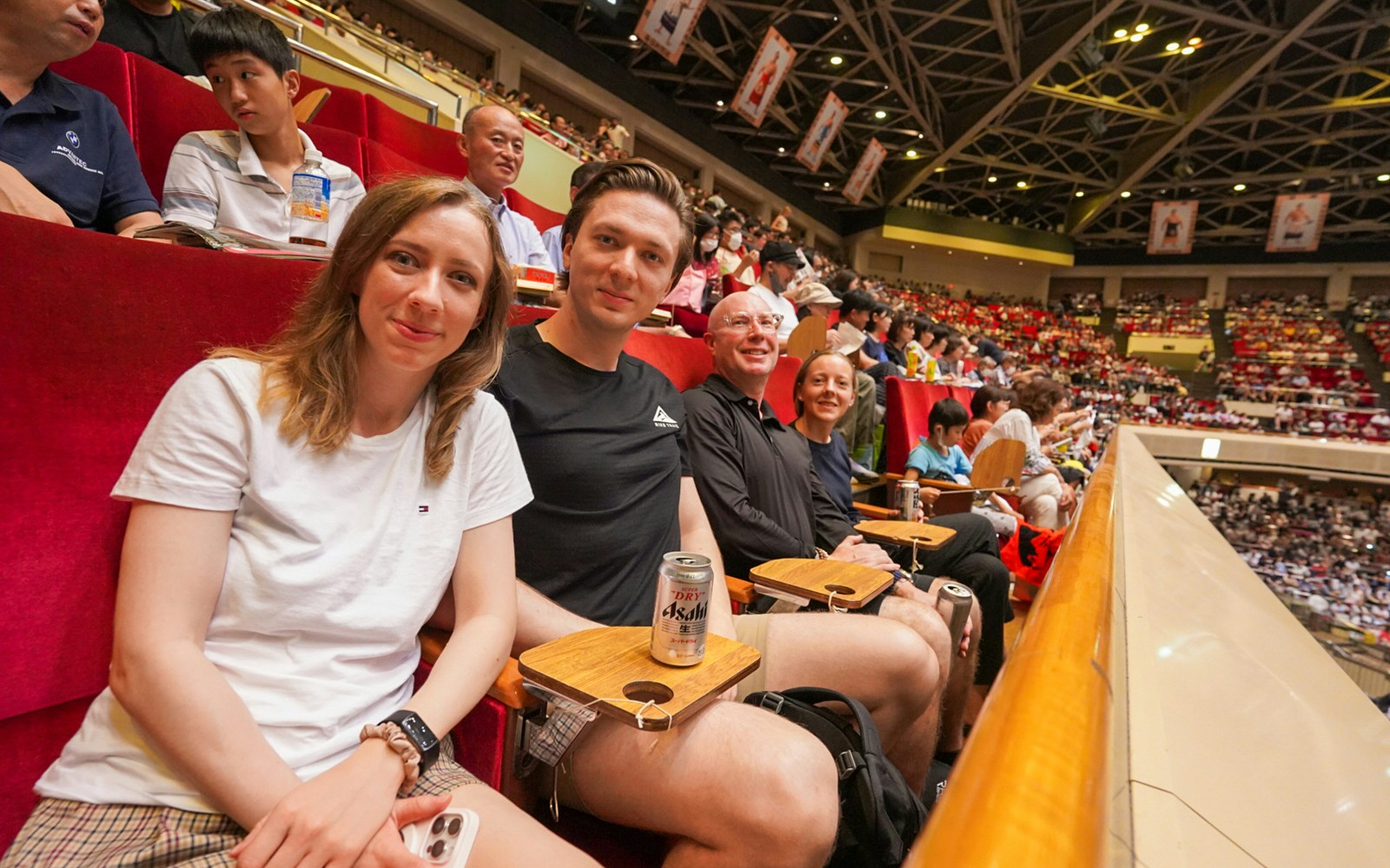 Spectators seated at Tokyo Sumo Wrestling Tournament in Ryogoku.