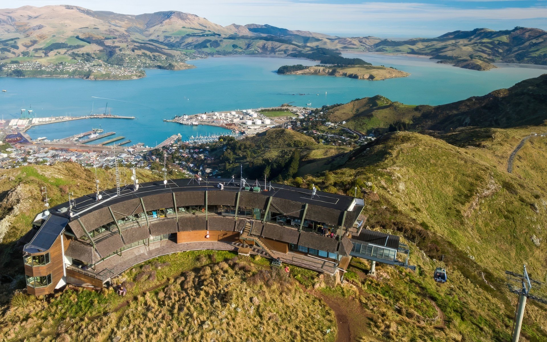 Panoramic view from gondola ride overlooking Christchurch harbor and hills.